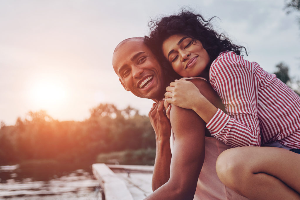 couple hugging happy