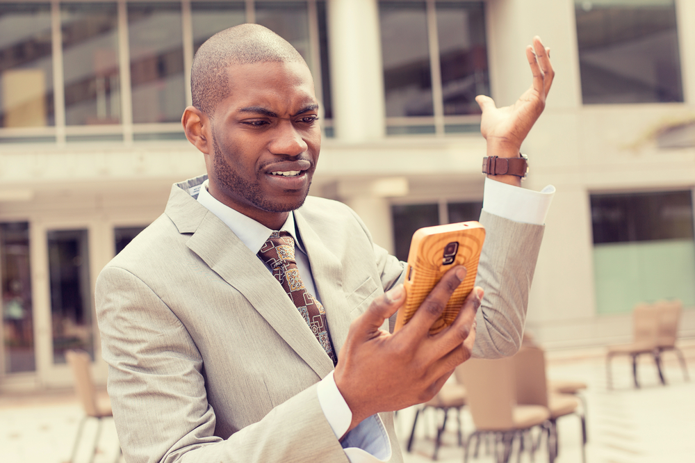 man getting spam messages from unknown number