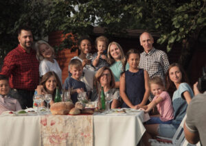 family posing for camera at reunion