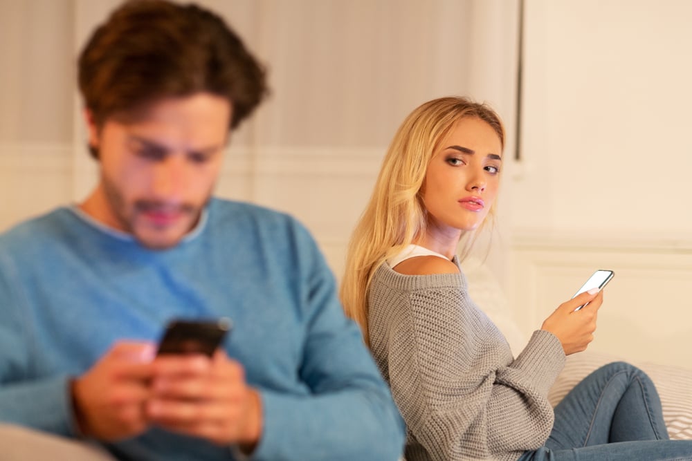 cheating man on phone not present with wife