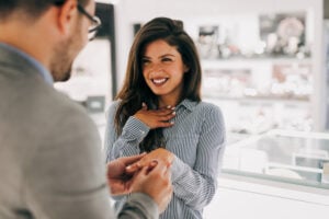 man ring shopping with woman